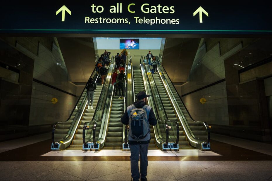 Person at an airport - escalator